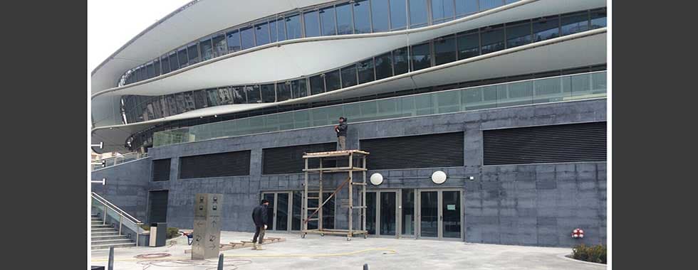 OPENING AND INSTALLATION OF WINDOWS AND GRANITE STONE CLADDING TO EXTERIOR WALLS OF NGA FACADE — photo 2