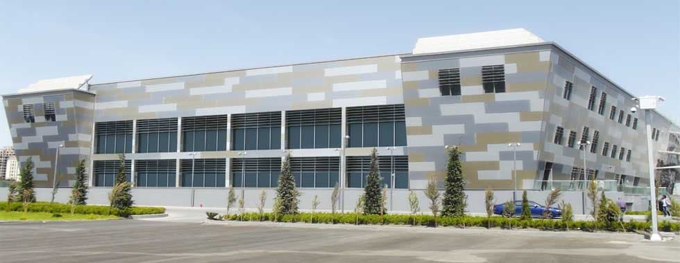 OPENING AND INSTALLATION OF WINDOWS AND GRANITE STONE CLADDING TO EXTERIOR WALLS OF NGA FACADE