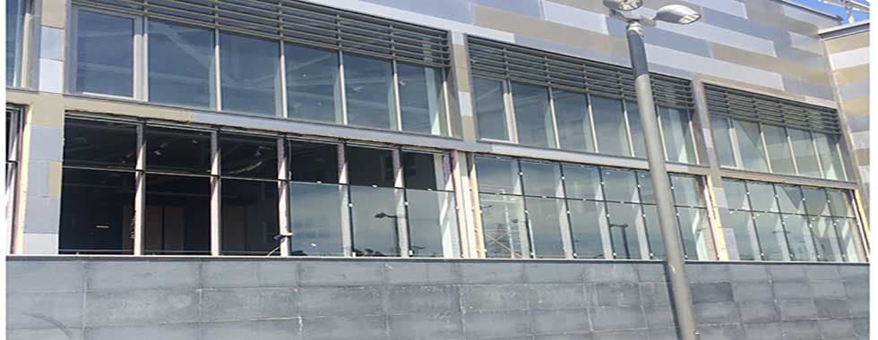 OPENING AND INSTALLATION OF WINDOWS AND GRANITE STONE CLADDING TO EXTERIOR WALLS OF NGA FACADE — photo 6