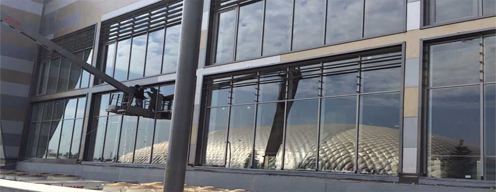 OPENING AND INSTALLATION OF WINDOWS AND GRANITE STONE CLADDING TO EXTERIOR WALLS OF NGA FACADE — photo 5